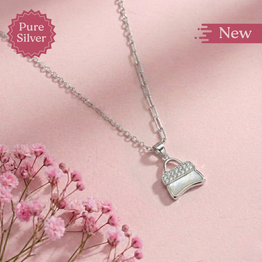 handbag pendant necklace